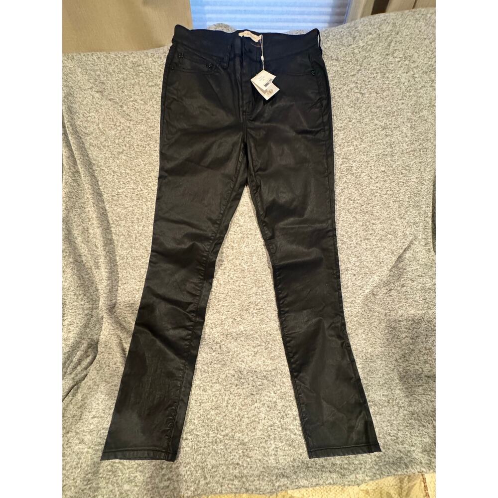 Black Tory Burch pants, style number 30151236, in size 29.